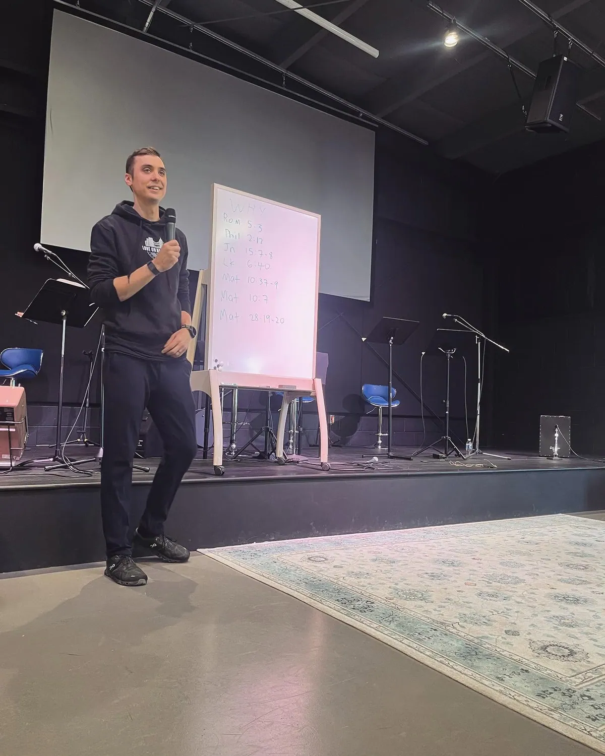 Teaching from a flip chart at a small Bible gathering